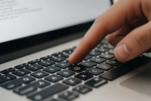 type @ on laptop keyboard